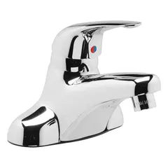 Centerset bathroom faucet with low arc spout, constructed of brass with a chrome finish. Flow rate is 0.5 gallons per minute. Includes flex hoses for supply connection. Suitable for lavatory sinks in residential and commercial restrooms.