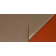 This vinyl shim stock sheet is ungraded and plain, measuring 10 inches wide by 20 inches long with a thickness of 0.03 inches. It is coral in color and has tolerances of +/-0.0625 inches for width and length, and +/-5% for thickness. Commonly used for precision alignment, gap filling, and spacing in industrial machinery and equipment.