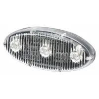 Amber LED oval perimeter warning light for vehicles, operating on 12-24V DC. Features 14 selectable flash patterns and includes self-adhesive mounting hardware with blunt cut wires for electrical connection. Commonly used on construction, utility, and material handling equipment to alert nearby personnel of vehicle movement or hazard