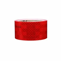 Red reflective tape with acrylic adhesive, 2 inches wide by 50 yards long. Designed for marking trucks and trailers to enhance visibility in low-light conditions. Used for vehicle conspicuity and regulatory compliance.