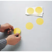 Solid yellow circle-shaped floor marking tape made of 4 mil thick vinyl. No legend printed on the tape. Each piece measures 5 in x 5 in. Supplied in a pack of 500. Used for marking safety zones, equipment locations, or hazard areas on floors