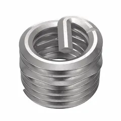 Screw-locking tanged helical insert for repairing or reinforcing threads in metal components. Features 5/16"-24 fine thread, 18-8 stainless steel, dry film lubricant finish, and tensile strength of 200,000 to 250,000 psi. Right-hand thread, STI tap size 5/16"-24. Supplied in a 500-piece pack.