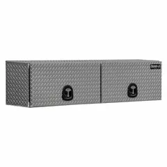 Double flip-up door topside box with T-handle compression lid and keyed lock. Silver finish. Designed for secure, organized storage of tools and equipment on truck beds, protecting contents from weather and theft.