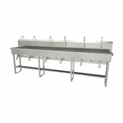 This six-station freestanding wash station is constructed of 16-gauge steel and includes faucets. It features a 117-inch bowl length and 8-inch bowl depth with a flow rate of 2 gpm. Side splash is not included. Suitable for high-traffic hand-washing areas in industrial settings.