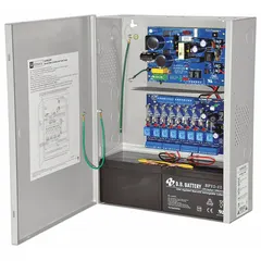 Steel-enclosed power supply board converting 115V AC input to selectable 12VDC at 3.5A or 24VDC at 3A. Features 8 fuse-protected outputs for distributing power to multiple low-voltage devices in access control, security, and fire alarm systems.