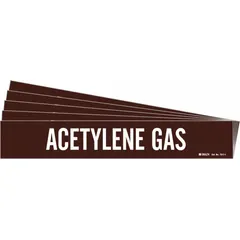 Adhesive pipe marker for identifying acetylene gas lines. Brown background with white legend text. Fits pipe outer diameters from 2-1/2 to 7-7/8 inches. Pack of 5 markers without directional arrows, suitable for straight pipe runs in industrial facilities.