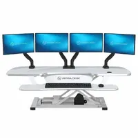 Electronic standing desk converter with a 48-inch wide white compressed wood desktop. Includes vinyl edge band. Allows users to alternate between sitting and standing positions at a workstation