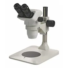 Binocular stereo microscope with 0.67X to 4.5X zoom range and 22 mm optical field of view. Includes 10X eyepieces with eyeguards, standard stand, and 100 mm working distance. Suitable for inspection, assembly, and quality control tasks requiring detailed observation of small components or specimens.