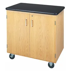 This wood mobile cabinet has an overall depth of 36 inches and overall width of 36 inches, finished in beige. Designed for flexible workspace organization, it can be easily repositioned to support collaborative or individual workstations in office environments.