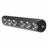 Amber rectangular perimeter flashing warning light with black bezel. Operates on 12-24V DC and features 30 selectable flash patterns. Electrical connection via blunt cut wires. Bolt mount type. Overall dimensions: 5/8 in wide by 1 3/8 in high. Used on vehicles to alert nearby personnel of movement or hazard