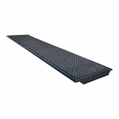 This fiberglass railroad track pellet pan measures 255 inches in length, 57 5/16 inches in width, and 4 1/2 inches in depth. It is used for spill containment in railcar unloading areas, capturing leaks and drips during bulk material transfer.