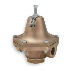 This bronze steam pressure regulator features FNPTF x FNPTF connections with a 1 1/4 inch inlet. It is designed to reduce and maintain downstream pressure in steam systems, commonly used in industrial heating, process steam, and commercial boiler applications.