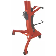 Palletizing drum truck designed for moving and positioning 55 to 85 gal metal drums. Features a spring-loaded clamp to secure the drum during transport. Red body finish. Suitable for use in warehouses, factories, and distribution centers for drum handling and palletizing tasks.