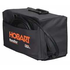 This black protective cover is designed for HOBART Handler and Multi-Handler 200 welders. It shields the equipment from dust, debris, and light impact during storage or transport, helping to maintain cleanliness and extend service life in workshop or job site environments.