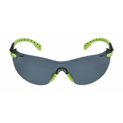 Frameless safety glasses with gray lens and Scotchgard™ Advanced Anti-Fog coating. Black/green frame. Suitable for eye protection in industrial environments such as machining, material handling, and maintenance.