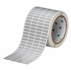 Precut label roll measuring 3 11/32 in x 1/4 in overall, with individual labels 1/4 in x 3/4 in. Constructed of metalized polyester in silver. Compatible with BBP11 printer series. Used for industrial identification, asset tracking, cable marking, and component labeling.