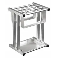 This GLARO umbrella stand is constructed of satin aluminum with a one-sided capacity holder style. It measures 12 inches wide, 18 inches high, and 10 inches deep, designed to accommodate tote-size umbrellas. Suitable for use in lobbies, offices, or retail entrances to keep wet umbrellas contained