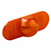 Amber oval turn signal light with incandescent lighting, designed for permanent grommet-mount installation. Complies with FMVSS 108 standards. Overall height 2 1/4 in, electrical connection via female pin. Commonly used on commercial vehicles and trailers to indicate turning or hazard intentions