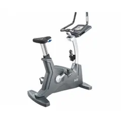 Self-powered upright exercise bike with 20 resistance settings. Overall length of 78 inches. Gray finish. Suitable for indoor cardiovascular training in commercial fitness settings.