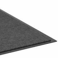 Medium-duty loop pile scraper mat for indoor/outdoor use. Measures 4 ft x 6 ft with a 5/16 in thickness and beveled edge. Constructed of polypropylene over vinyl in gray. Traps dirt and moisture at entryways to reduce slip risks and floor wear