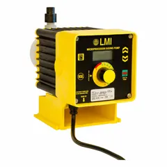 Compact solenoid-driven diaphragm metering pump with PVC head, PTFE diaphragm, and ceramic check balls. Max flow rate 96 gpd at 115V AC, reproducibility ±1.0%. Fittings in PVC, seals in PVDF/Polyprel. Used for precise chemical dosing in water treatment and industrial processing.