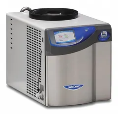 Benchtop freeze dryer with a -50°C operating temperature and 2.5 L dry ice holding capacity. Includes a 3-wire electrical cord with plug. Drying chamber and purge valve are not included. Used for lyophilizing heat-sensitive materials such as biological samples, pharmaceuticals, and food products.