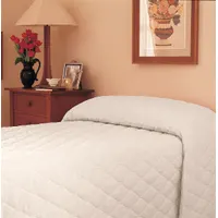 This MARTEX bedspread is a quilted cover for king-size mattresses, made from a cotton/polyester blend fabric with polyester fiberfill. It features a solid bone color and measures 120 inches in length and 118 inches in width. Suitable for hospitality or residential use as a decorative layer and light warmth
