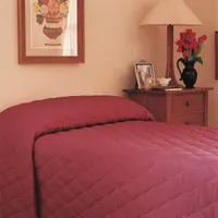 This MARTEX bedspread is sized for queen mattresses, measuring 118 inches in length and 100 inches in width. It features a solid Chianti-colored cotton/polyester blend fabric with a quilted stitching pattern and polyester fiberfill. Suitable for use as a decorative top layer in hospitality or residential settings