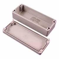 This nonmetallic enclosure is constructed of polyester and measures 7 inches by 2 inches by 2 inches. It features a solid cover secured with screws and carries a NEMA 4/4X rating for protection against water, dust, and corrosion. Typical applications include housing electrical and electronic components in indoor or outdoor environments where moisture or corrosive conditions are present