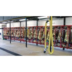 Steel wall-mount rack with red finish, 199 inches long. Provides 8 compartments on one side for organized storage of firefighter turnout gear in stations or training facilities.