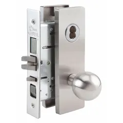 This office knob lockset features a stainless steel construction with an MR162 ball knob style. It includes an interchangeable core for easy rekeying and is ADA compliant for accessibility. Suitable for use in commercial and institutional door applications.