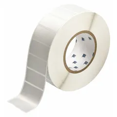 Precut label roll measuring 1 in x 2 in with a tamper-indicating checkerboard footprint pattern. Designed for use with the BBP11 printer series. The pattern reveals unauthorized removal attempts by leaving a visible residue or void message.