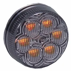 LED clearance marker light with round, surface-mount design and amber lens. Features grommet mounting, PL-2 connector, and IP67 rating. SAE P2 compliant. Used on trucks, trailers, and heavy equipment for side visibility marking.