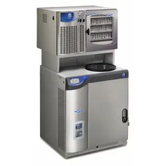 Console freeze dryer with a stoppering tray dryer chamber and 6 L dry ice holding capacity. Includes a 3-wire electrical cord with plug. No purge valve included. Used for lyophilizing heat-sensitive materials in laboratory and small-scale production settings.
