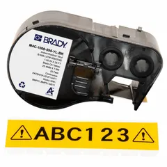 Continuous label roll cartridge integrating label and ribbon for streamlined loading. Vinyl material with black-on-yellow printing. Designed for use with the M410 printer series. Suitable for industrial labeling tasks such as asset identification, safety warnings, and pipe marking.