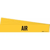 Yellow adhesive pipe marker with black legend 'Air' for identifying compressed air or pneumatic piping systems. Fits pipe outer diameters from 2-1/2 to 7-7/8 inches. Supplied in a 5-pack without arrows. Suitable for industrial facilities to indicate pipe contents and reduce misconnection risks
