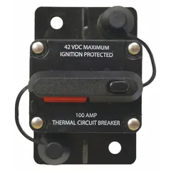 Surface mount heavy duty circuit breaker with stud terminal connection. Rated 42V DC and 100 A interrupt at 12V DC. Suitable for overcurrent protection in automotive electrical systems.