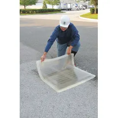 This self-sealing drain cover seal is made of clear polyurethane with a thickness of 3/8 in. It measures 58 in L x 36 in W and accommodates a maximum drain size of 52 in L x 30 in W. Designed to cover industrial floor drains, it helps prevent debris, spills, and vapors from entering drainage systems.