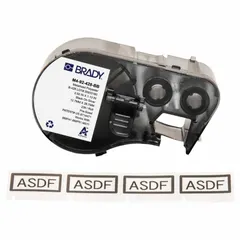 This precut label roll cartridge combines label and ribbon in one unit for streamlined loading. The metalized polyester material provides resistance to harsh environments. Labels measure 1 1/8 in x 1/2 in with black-on-gray printing. Compatible with BMP51 printer series. Used for industrial identification such as cable markers, asset tags, and safety signs.