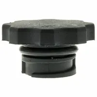 Plastic, black, vented oil filler cap with 2 5/16 in cap diameter, 1 3/8 in neck diameter, and 1 5/16 in neck length. Quick-On attachment type, not lockable. Used to seal oil reservoirs on engines and equipment, allowing pressure equalization while preventing contamination