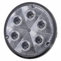 This GROTE LED spotlight features a black housing and blunt cut wires for electrical connection. Designed for use on tractor trailers, it provides illumination for backing, loading, and general vehicle safety. The blunt cut wire design simplifies installation on commercial trucks and heavy equipment