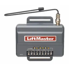 The LIFTMASTER 850LM is a universal garage door receiver designed for use with control keypads. It features an internal antenna and is housed in a gray polycarbonate enclosure with a 3-inch overall height. This receiver enables wireless communication between compatible keypads and garage door openers or gate operators, providing keyless entry functionality.