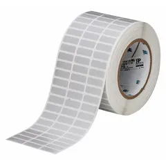 Gray polyester precut label roll measuring 3/8 in x 1 in, with 10,000 labels per roll. Compatible with BBP11 printer series. Used for industrial identification, asset tags, cable markers, and safety labels in environments requiring chemical and abrasion resistance.
