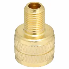 This clamp-in cap adapter features an L-shape design for angled access in confined spaces. Made of brass with a 0.458-26 thread, it adapts large bore tire valves to standard bore sizes for inflation or pressure monitoring on industrial vehicles and equipment.