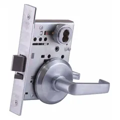 This storeroom lever lockset features a satin chromium-plated stainless steel finish and an interchangeable core. It is ADA compliant and designed for ANSI F07 function, providing keyed entry from outside and free egress from inside. Suitable for interior doors in commercial settings where security and accessibility are required.
