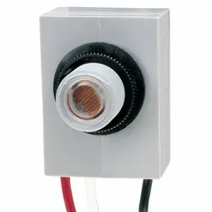 Flush-mounted photocell for automatic dusk-to-dawn lighting control. Designed for in-post installation with a 3/8-inch stem diameter and lock nut for secure mounting. SPST switching operates connected fixtures when ambient light drops. Suitable for outdoor area lighting, parking lots, and pathways.