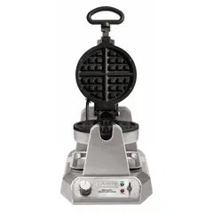 This Belgian waffle maker features a 7-inch square cooking surface depth. It operates on 120V AC power and is suited for commercial foodservice environments such as restaurants, hotels, and cafeterias.