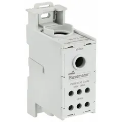 Surface-mount power distribution block with finger-safe design. Accepts line side wire sizes from 6 AWG to 500 kcmil. Lug-to-lug configuration for aluminum conductors. Used to distribute a single incoming power source to multiple branch circuits in electrical distribution systems.