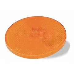 Round amber stick-on reflector with acrylic construction, measuring 3 5/16 in overall length and width. Complies with SAE A standards for passive visibility. Used for marking vehicles, trailers, and industrial equipment in low-light conditions.