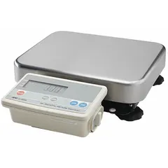 This bench scale features a stainless steel weighing surface and a remote indicator for flexible placement. With 0.002 kg readability and an RS-232C port for data output, it is suited for general weighing tasks in industrial, packaging, and quality control environments. The scale is not IP rated and has an integrated design.